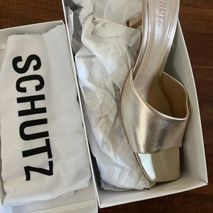 Never worn only to try on gold kitten heels. Left show hasn’t been unwrapped